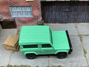 Matchbox Land Rover Defender 90 Mint Green - rear angle view showing tampo details