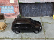 Matchbox LEVC TX Taxi Black loose diecast - side profile detail shot
