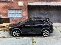 Matchbox Mazda CX5 Black - rear angle view showing tampo details