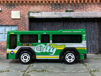 Matchbox MBX City Transport City Bus Green - rear angle view showing tampo details