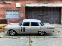 Matchbox Mercedes 220SE Gray and White 711 - rear angle view showing tampo details