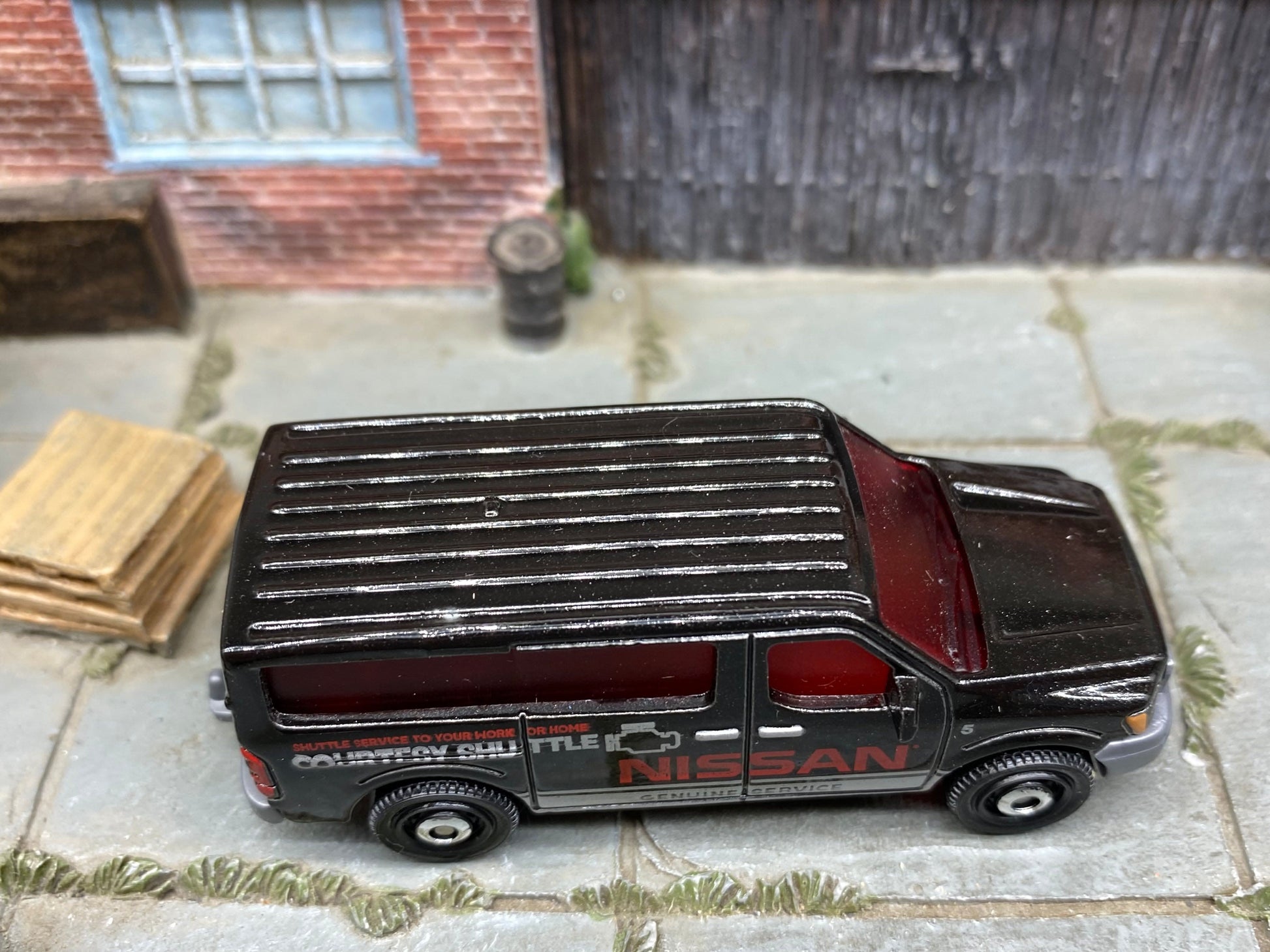 Loose Matchbox - Nissan NV Van - Black and Silver Courtesy Shuttle