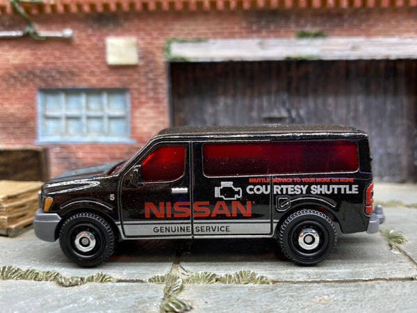 Matchbox Nissan NV Van black and silver Courtesy Shuttle loose diecast - gallery image 1 of 3