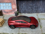 Matchbox Tesla Roadster Satin Dark Red loose diecast - side profile detail shot