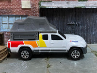 Matchbox Toyota Tacoma Tent Camper White, Red and Yellow - rear angle view showing tampo details