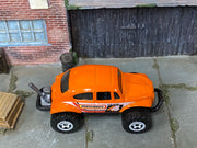 Matchbox Volkswagen Beetle 4X4 Off Road Orange Matchbox loose diecast - side profile detail shot