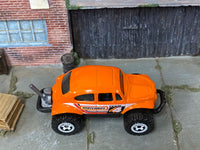Matchbox Volkswagen Beetle 4X4 Off Road Orange Matchbox loose diecast - side profile detail shot