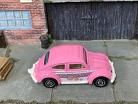 Matchbox Volkswagen Beetle Pink and White Peace loose diecast - side profile detail shot