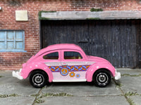 Matchbox Volkswagen Beetle Pink and White Peace - rear angle view showing tampo details
