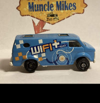 Blue Matchbox '75 Chevrolet Van with WiFi Repair graphics, view 1