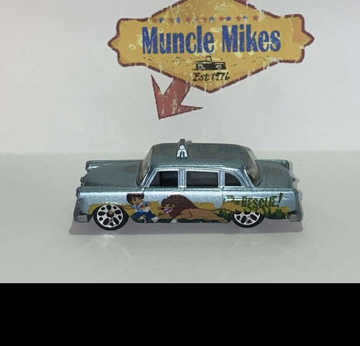 Blue 2003 Matchbox Checker Cab with Lion and Boy To The Rescue graphics, view 1