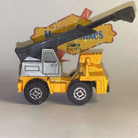 Orange Matchbox Faun mobile crane with black boom, view 2