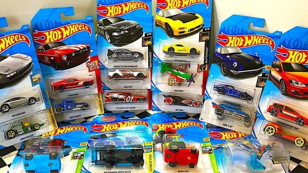 Assortment of individually packaged Hot Wheels cars