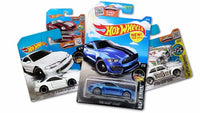 Multiple packaged Hot Wheels cars in a random assortment