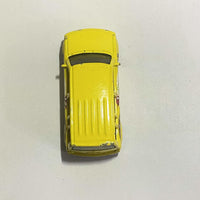 Yellow 2004 Matchbox Scion with Mickey Mouse Blast Off graphics, view 4